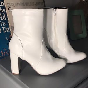 White patent leather ankle booties